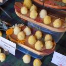 The Red Oak Garden table has honeycomb candles for sale.