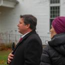 Families and friends stood in silence while bells filled the air.