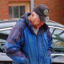 Heads bowed honoring alive and fallen soldiers at the bells.