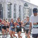 Pease running the Berlin Marathon, September 21, 2025 with her running partner, Kristen Wingate.