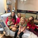 Pease and her 4 children visiting in the hospital, December 5, 2024, the day Pease was diagnosed with MS.