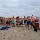 Nearly 50 people participated in the Christmas Day Swim at Mattapoisett Town Beach. Photo source: Debbi Dyson