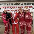 Families — and dogs — attended the swim.