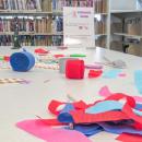 Streamer wands cover one of the tables in the library. 