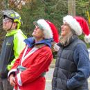 From left: Noah Knowles, Mary Dermody and Sarah French Storer watch the hat installation. 