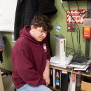 Moskos smiles with his repaired Xbox 360.