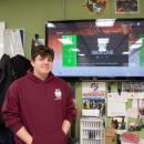 Moskos stands proudly in front of his work. Source: Rick Durta