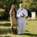Rochester residents Miah Motta and her father Ryan Motta standing his beehives on their property. Photo by Grace Ann Natanawan