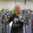 Botelho shakes her pom poms.