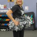 Botelho poses with her pom poms.
