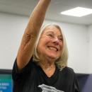 Botelho smiles her cheerleader smile.