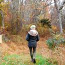 Diane Pienta heads into the marsh.