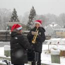 One trumpet player prepares for the song.