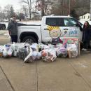 Board member Sam Philbrook, left, and Christina Tetrault, a guidance councilor at Sippican Elementary School, during a toy delivery to the school on Sunday Dec. 18, 2025. 