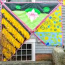 Along with painted designs, some panels also featured fabric and other decorations. 