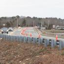 Cars travel the narrowed Route 6 bridge across the Weweantic River amidst ongoing construction. Photo by Grace Roche