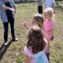 Kids play a relay game while learning about pollinators during a group meeting Wednesday, April 8.