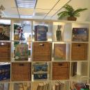 Books and other educational materials line the shelves inside the Learning Loft. 