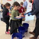 Rochester Memorial students learn where to put their food for the activity. 