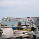 Four years later, the boatyard has recovered from the fire. 