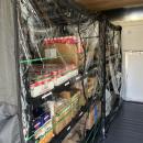 The pantry's shelves are full and ready for shopping. 