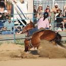 Ali Edwards kicks up dirt. 