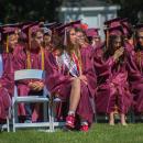 Graduates look on during the ceremony. 