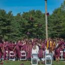 The graduates of the class of 2026 throw their caps in the air at Old Colony's commencement Sunday, May 31. Photos by Grace Roche