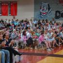 Community members packed the gym for the indoor ceremony. 