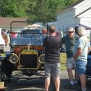Visitors admire a Model T from 1914 at the Rochester Center on Aging on Thursday, June 11. Photos by Grace Roche
