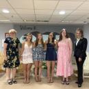 Club President Tara Calabrese and Scholarship Chair Kathy Tibbetts pose with the recipients.