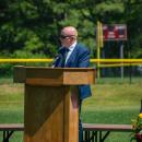 Gary Linehan, principal of Old Colony Regional Vocational Technical High School, speaks at a graduation. Photo by Grace Roche