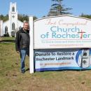 Pastor Colby Olson, right, trustee Michael Costa erect a fundraising banner with the church in the background. Photos source: First Congregational Church of Rochester