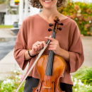 Anna Griffis plays the violin and viola in local and international ensembles. Photo source: Ariadne Daskalakis