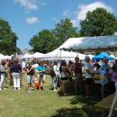 The Lions Club served food under the big white tent in the park. 