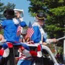 Some parade participants dressed like it's 1776. 