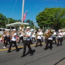 The Marion Concert Band marches down Route 6. 