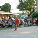 All Season Services, in gray, beat Yell4Fun, in orange, at the Embargo Summer League's championship game Sunday, Aug. 9. Photos by Grace Roche