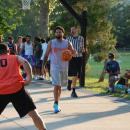 Dame Perry takes the ball up court. 