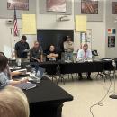 Luis Rivera speaks at a June 3 Rochester School Committee meeting. Photo by Grace Roche