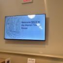 A sign welcomes people to the newly-renovated space. 