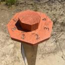 The bright orange top of the post has numbered sides to show the order photos should be taken in. 