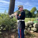 Mark Paradis, executive director of Taps for Veterans, played “Taps” on the trumpet. The organization’s mission is for every veteran to receive a live, 24-note salute, and it has over 1,500 volunteers across the nation that attend events such as these.