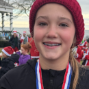 Madelyn Eitas ran a race in December 2025 before her death earlier this year. Photo source: Forever 1111 Fountation