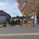 Cyclists wait to leave Red Brick Farm. 
