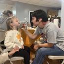 Morgan Suddard, 4, get her face painted during the event. 