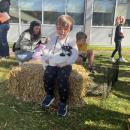 Jake Dias, 3, pets a bunny that's snuggled up in his arms at the family fun day at Old Rochester Regional High School on Saturday, Oct. 24. Photos by Grace Roche