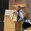 Todd Partridge speaks during the meeting. 