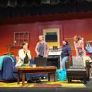 Four Actors are onstage talking.