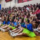 Senior students wave their hands in the air during their class skit, which had a "Toy Story" theme. Photos by Tanvi Kulkarni